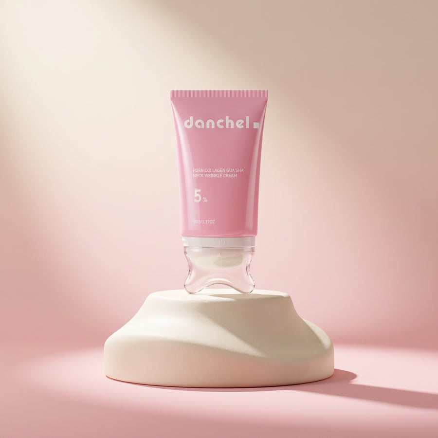danchel PDRN Collagen Neck & Contour Cream – pink tube with built-in gua-sha applicator