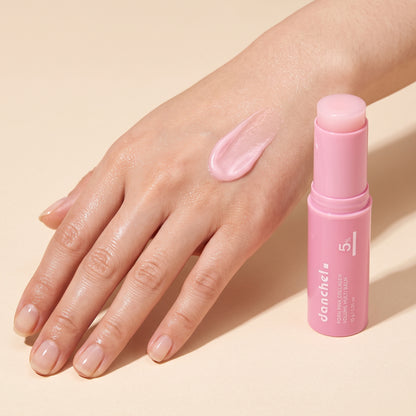 Pearly pink glow balm swatch on skin